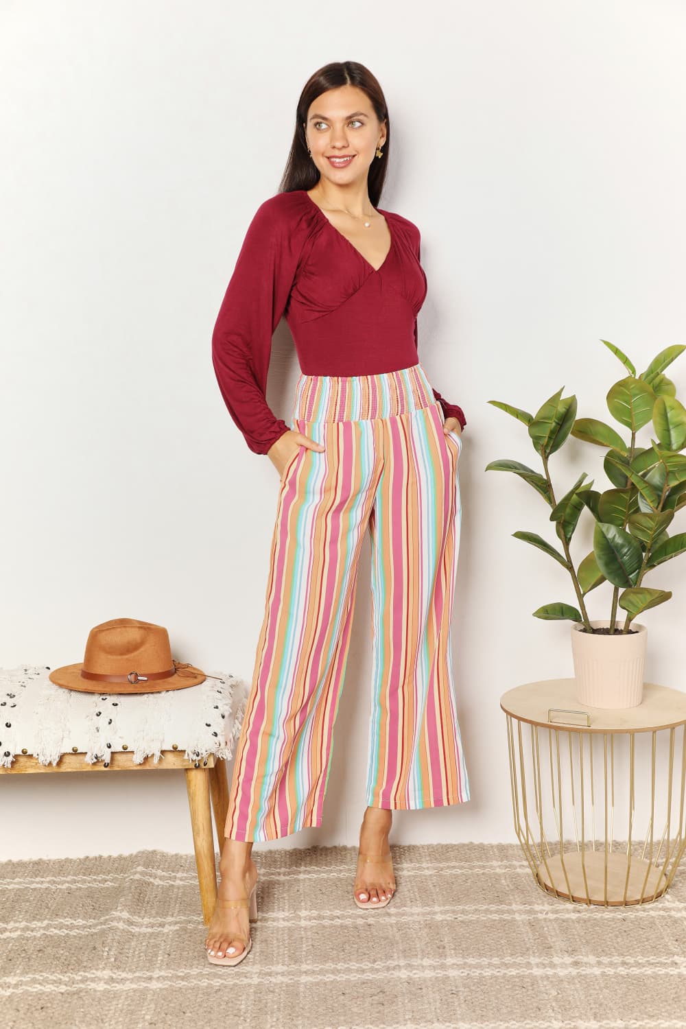 Multicolor striped culotte-style pants with smocked waist and side pockets