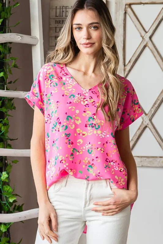 Plus-size pink multi animal-print V-neck short-sleeve T-shirt close-up
