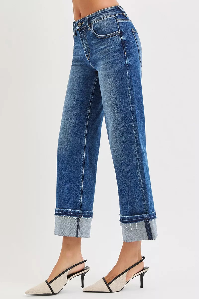 Back view of mid-rise straight jeans with cuffed ankle hem and denim stitching