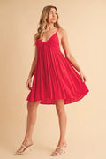 Red ruched plunge mini cami dress with crossover bodice and gathered skirt