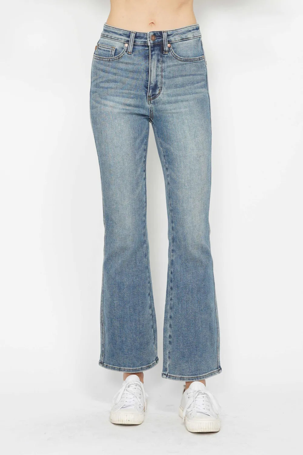 Light blue bootcut jeans, front view; embroidered back pockets and belt loops
