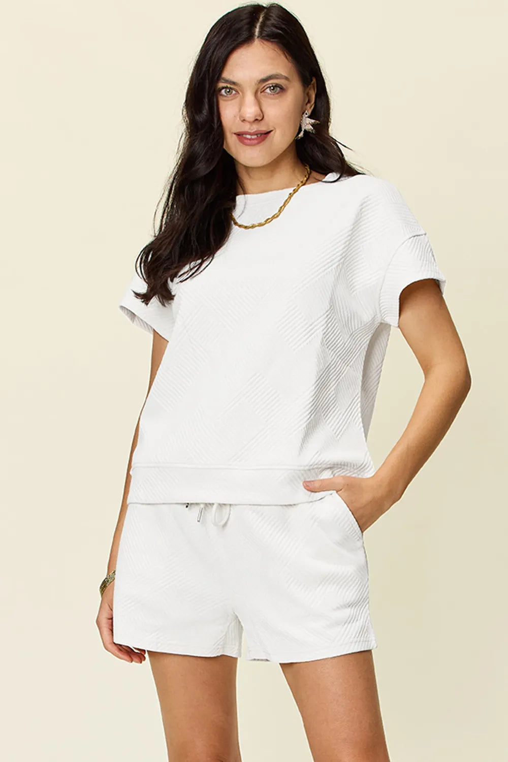 White textured short-sleeve T-shirt with drawstring shorts set, front view