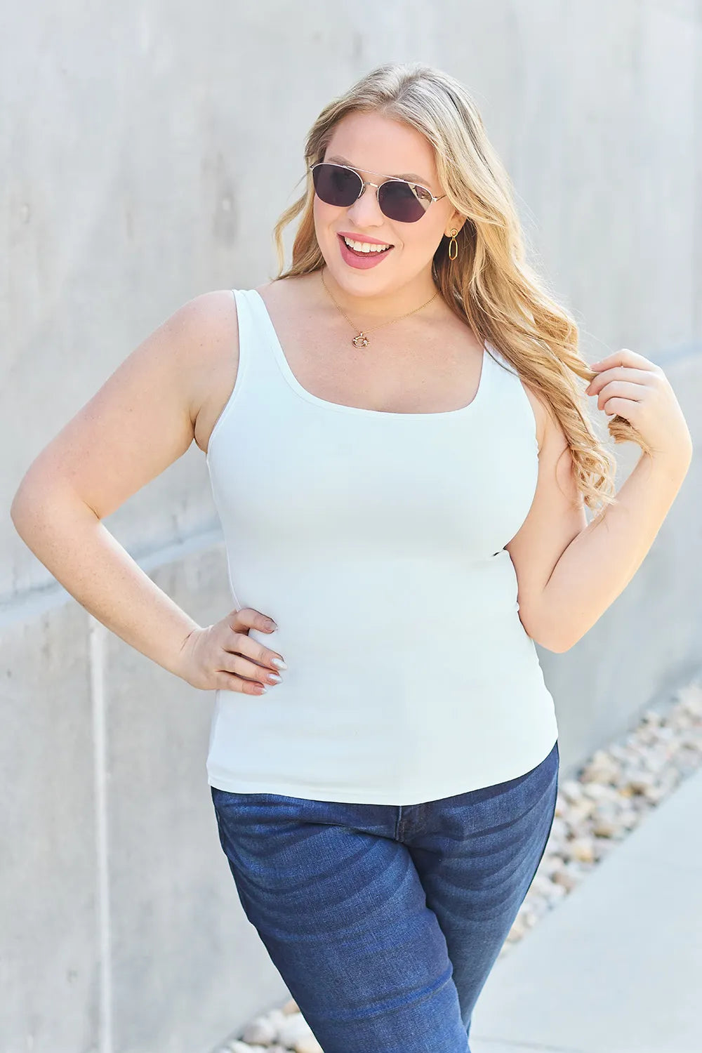 Light-colored square-neck wide-strap tank top with wide straps