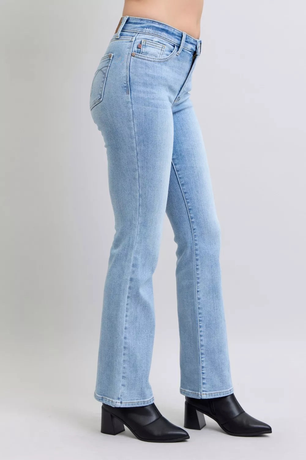 Light wash mid-rise bootcut thermal jeans with front pockets and belt loops