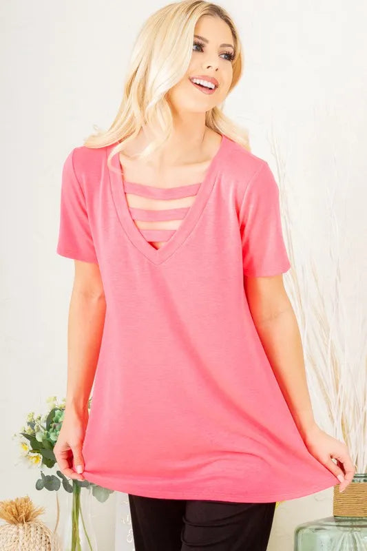 Neon pink V-neck T-shirt in plus size, angled front view with neckline cutout