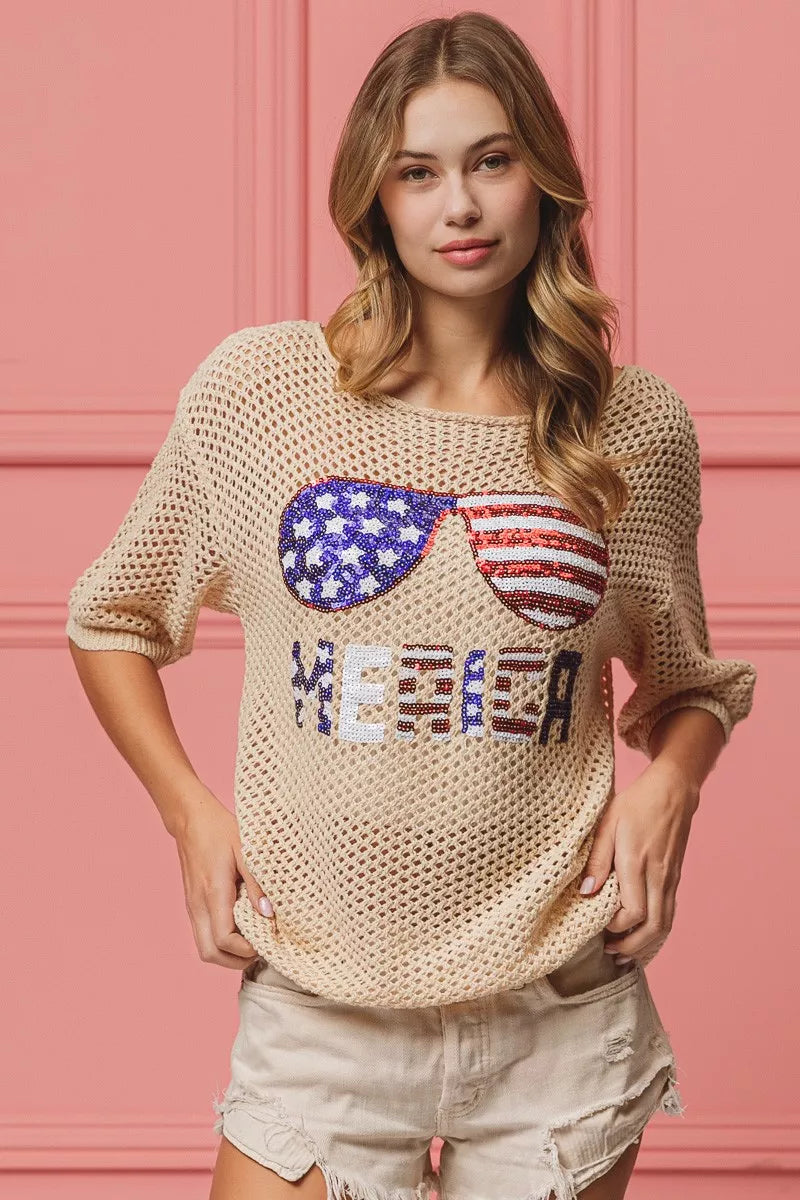 OATMEAL knit cover-up with sequin sunglasses graphic and multicolor block letters