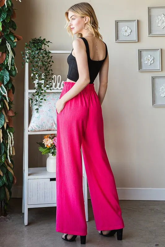 Watermelon paperbag waist pants, back view, wide-leg flow