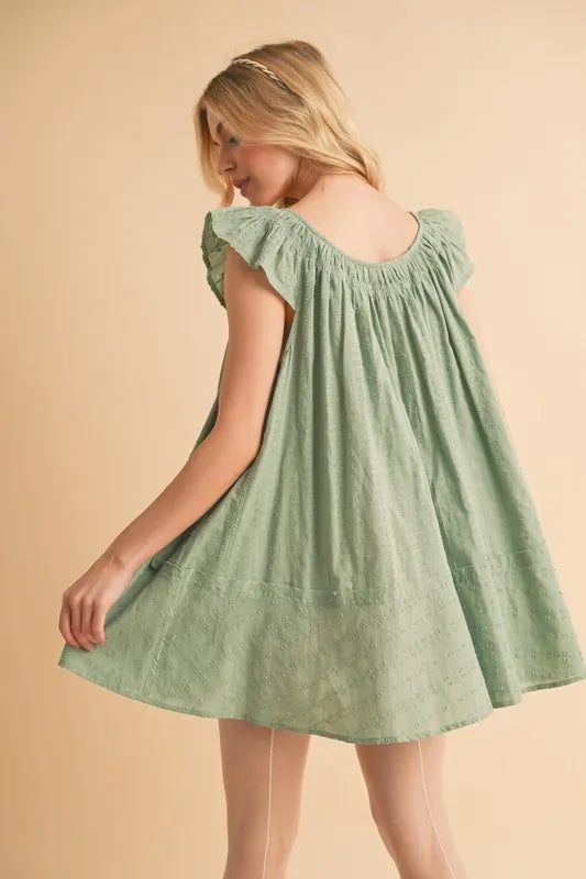 Pistachio mini tunic dress, ruffled cap sleeves, gathered back yoke, flared skirt
