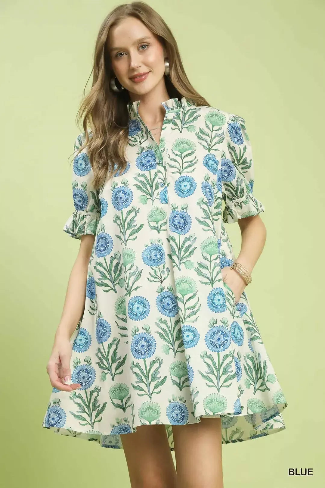 Blue floral babydoll dress with puff sleeves and buttoned keyhole neckline