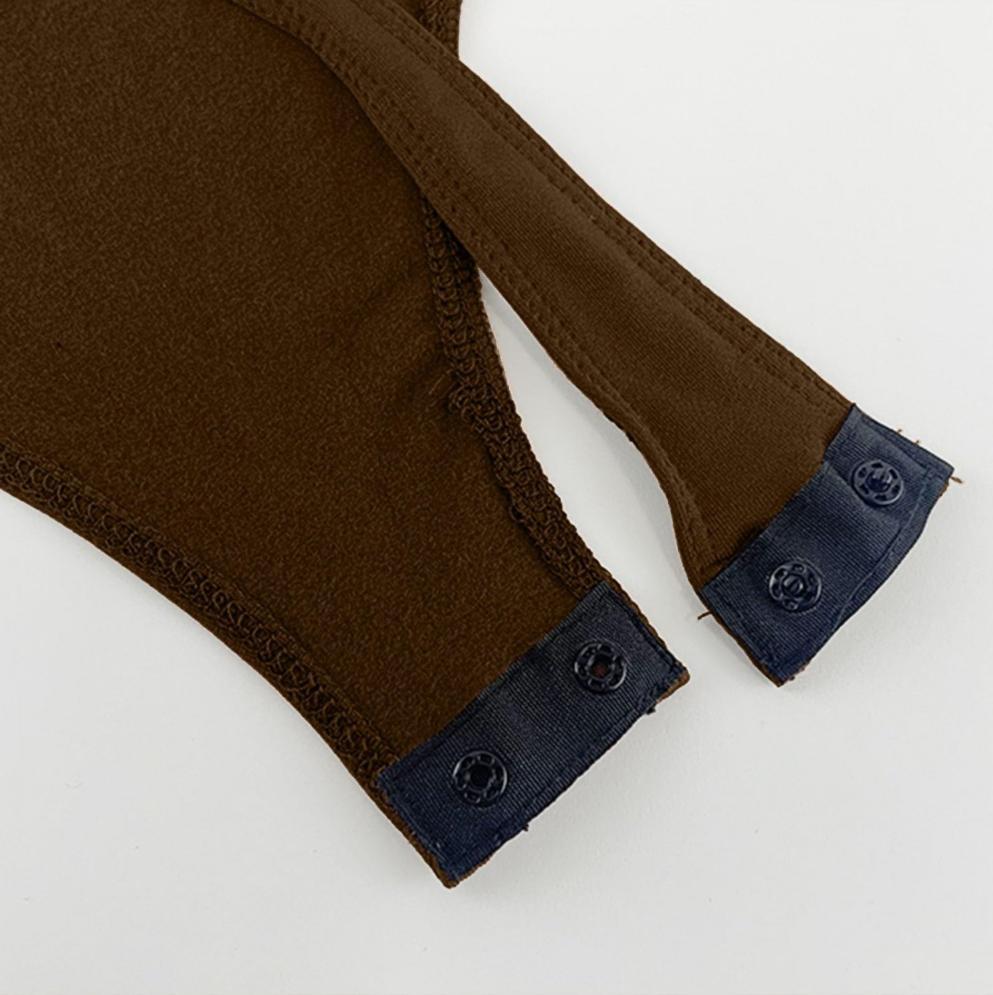 Brown long-sleeve bodysuit cuffs with dark trim