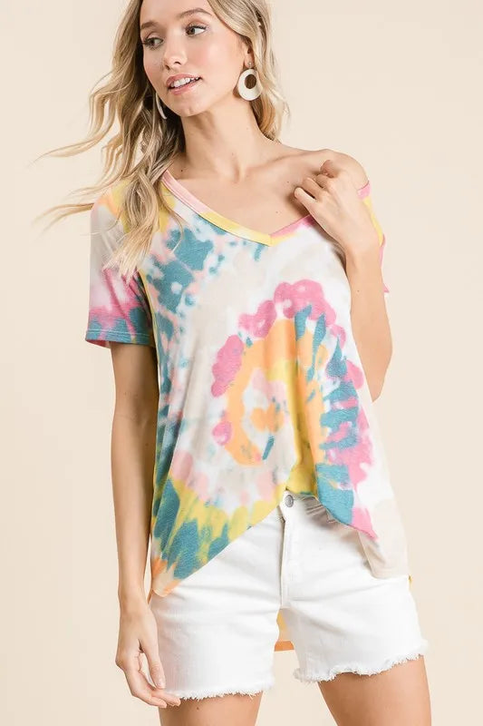 V-neck tie-dye top, yellow-orange with pink and teal blotches; short sleeves and drape hem