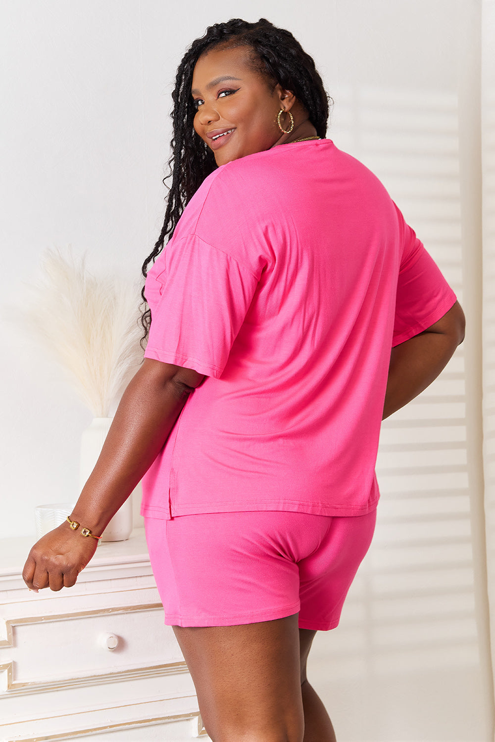 Hot pink rayon top and shorts set, back view with half sleeves and matching shorts