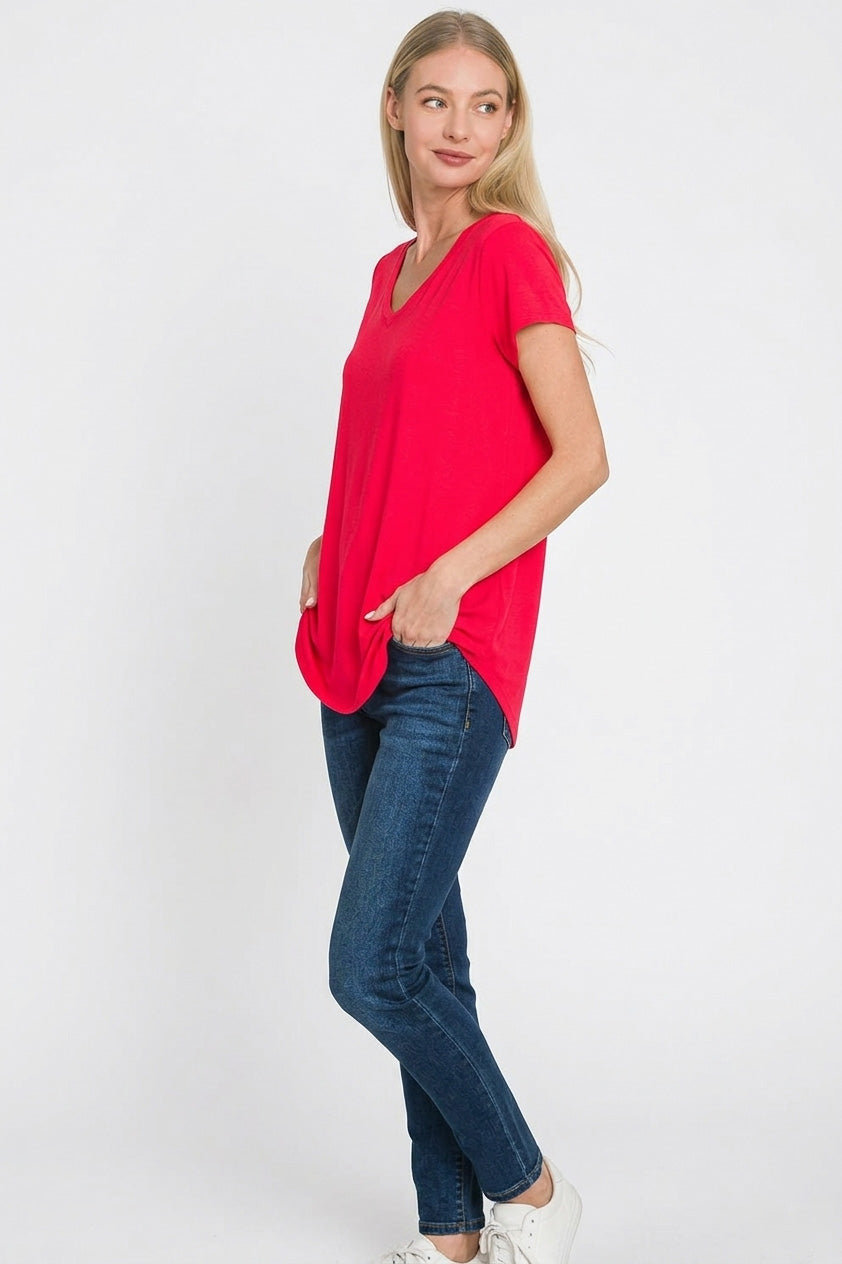 Ruby red V-neck rayon top with short sleeves and relaxed side drape