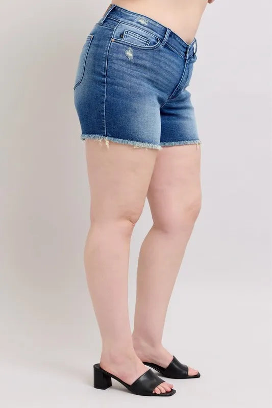 Blue denim shorts back/side view with frayed hem, back yoke, and belt loops