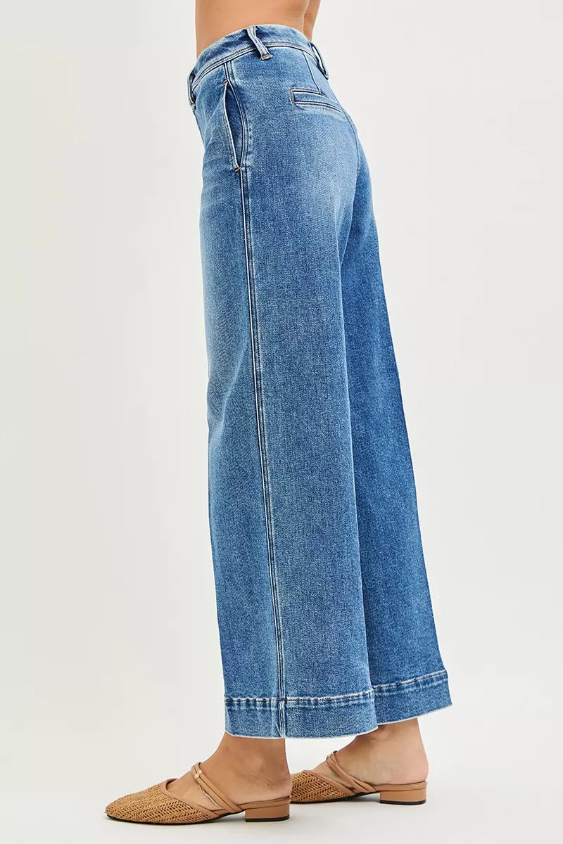 Slouchy ankle wide jeans, dark blue denim side view with stitched seam and wide leg