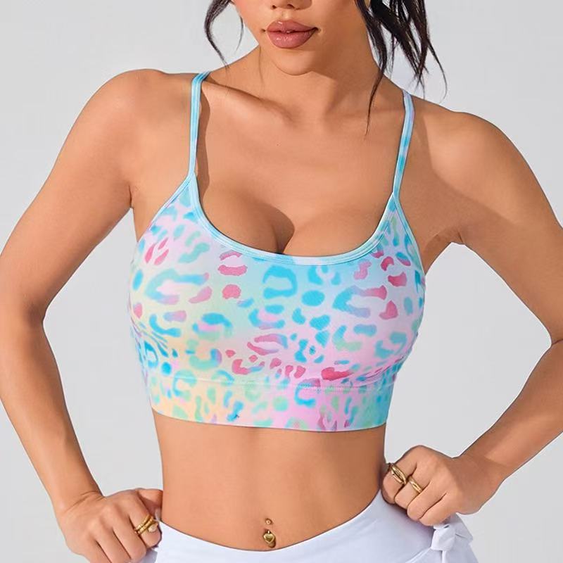 Floral print sports bra with light blue straps and cross back, front view