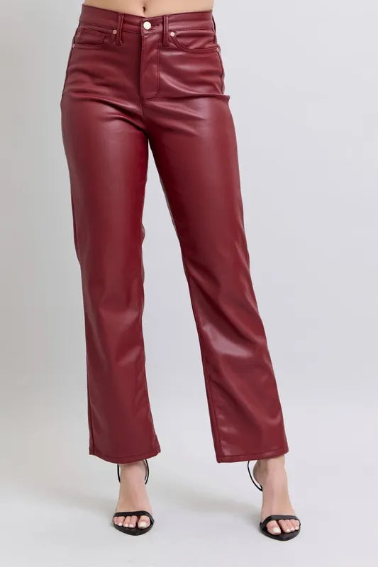 Red high-waist faux leather straight pants with belt loops and front pockets