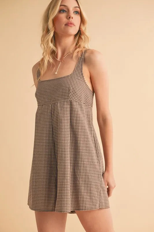 Plaid square-neck romper in chocolate, sleeveless with gathered skirt