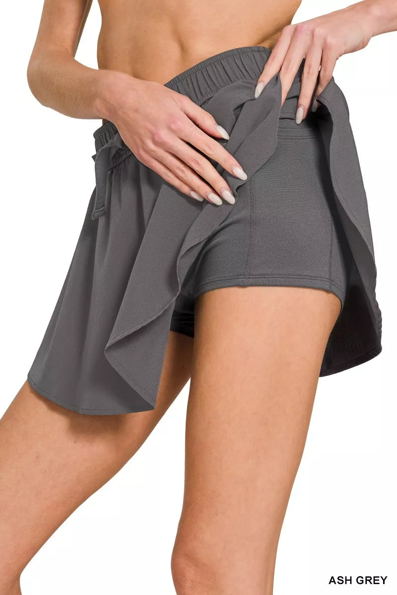 Ash grey skort waist detail: elastic band, drawstring bow, layered skirt hem