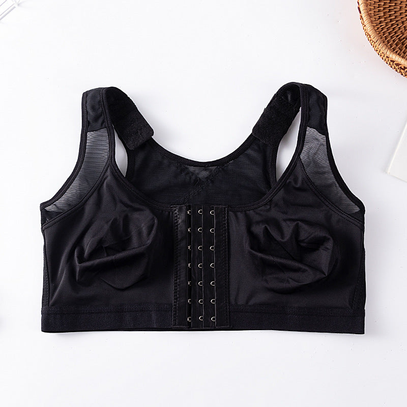Front-closure sports bra in black with hook-and-bar center front and padded cups