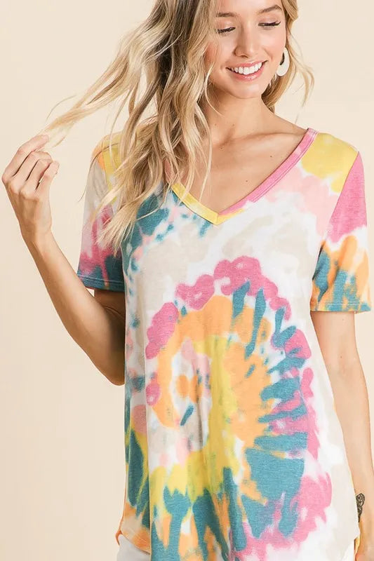 V-neck tie-dye T-shirt in yellow-orange tones with pink, teal, and blue splatter design