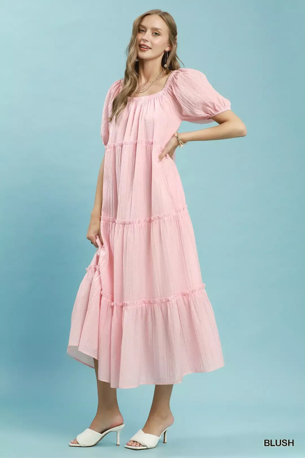 Blush tiered midi dress with layered ruffles and short puff sleeves