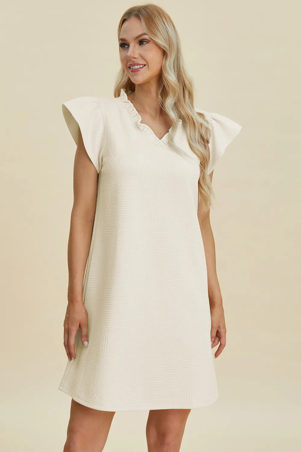 Cream ruffled V-neck cap sleeve dress, short sleeves and A-line skirt