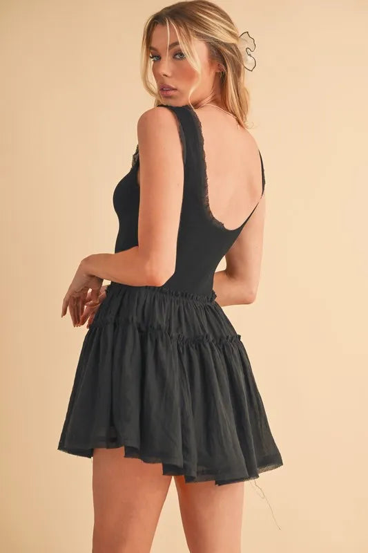 Black sleeveless mini dress back and side view with open scoop back
