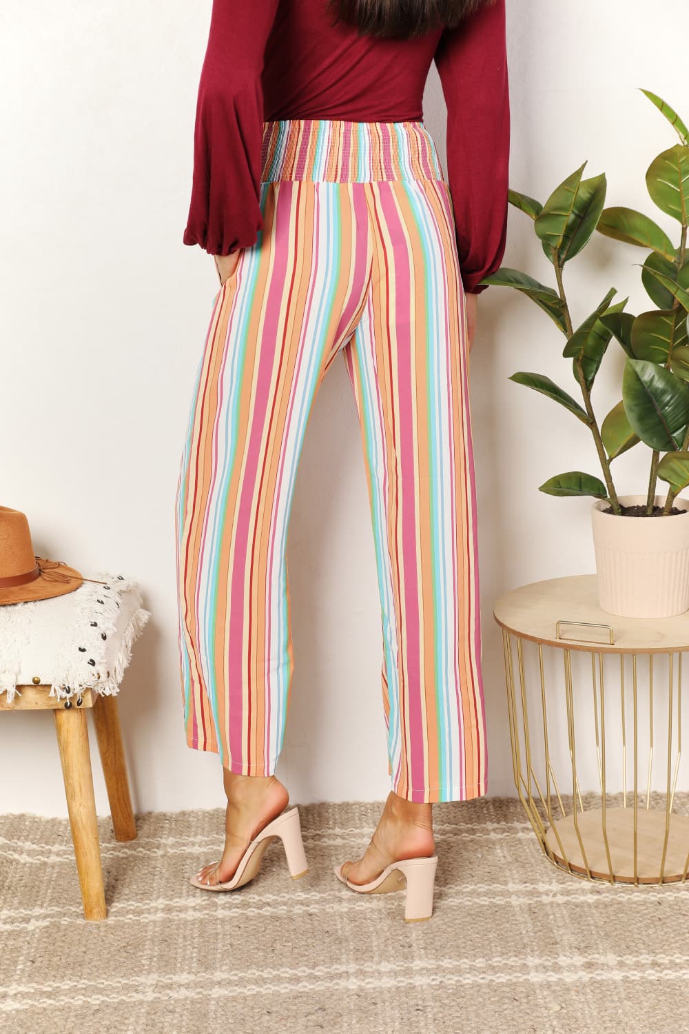 Multicolor striped wide-leg pants with smocked waistband and side pockets