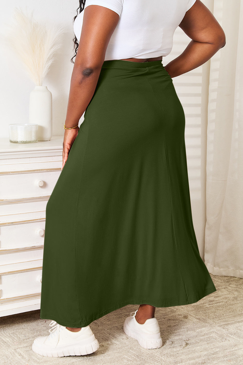 Dark green maxi skirt with front waist drawstring and wide A-line hem
