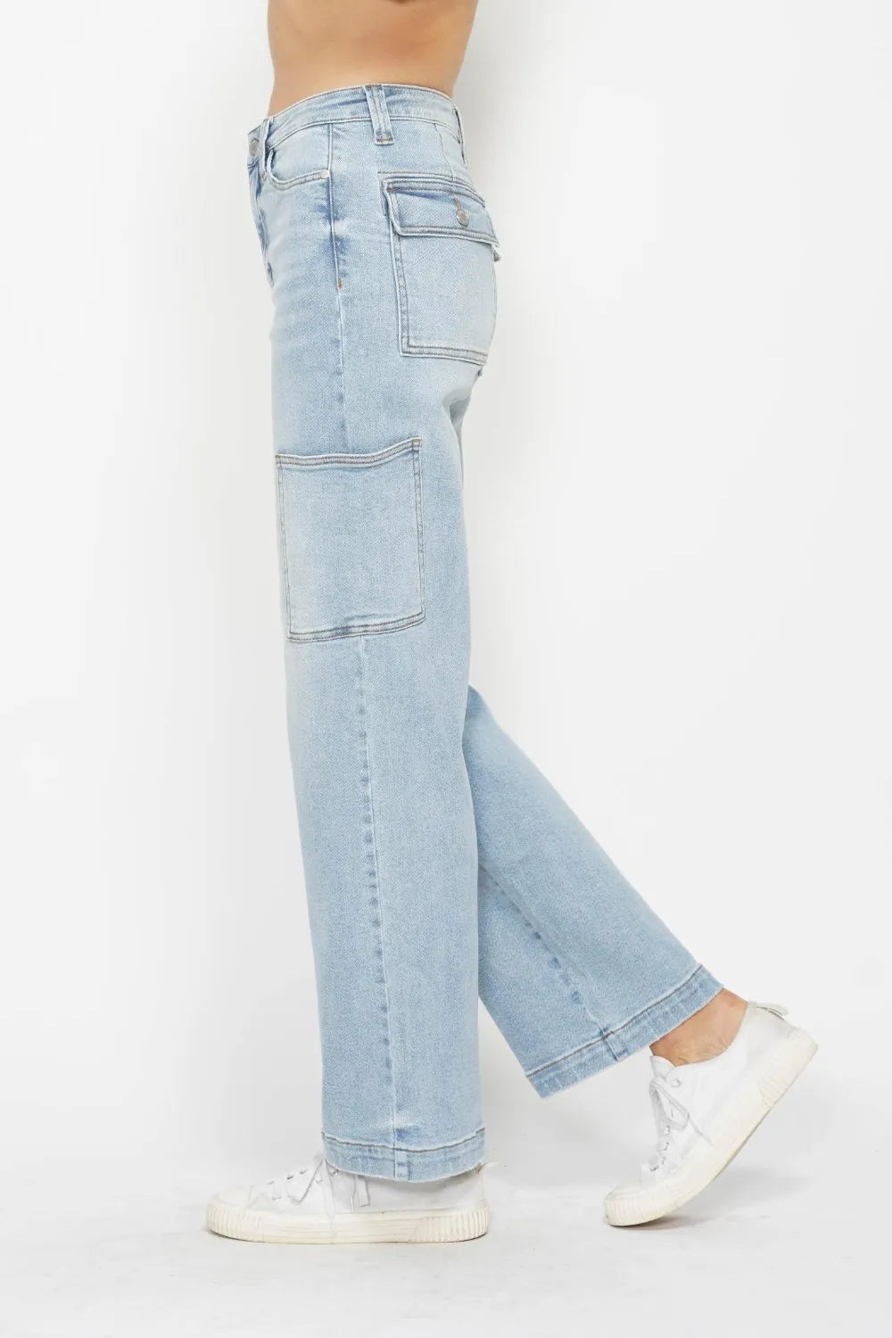 Light blue straight cargo jeans, side view with cargo pockets and cuffs