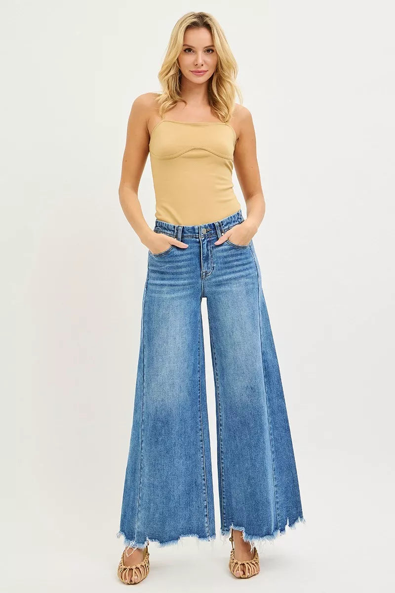 High-rise ankle wide-leg jeans in medium wash with frayed cuffs