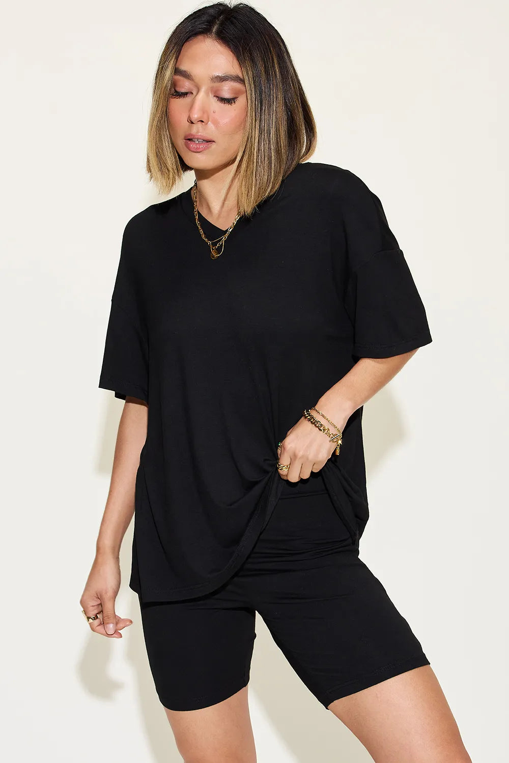 Black V-neck T-shirt and shorts set, draped tunic hem style