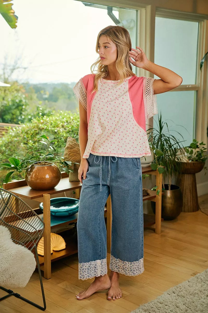 Denim wide-leg pants with elastic waistband, drawstring tie, and flower lace trim hem