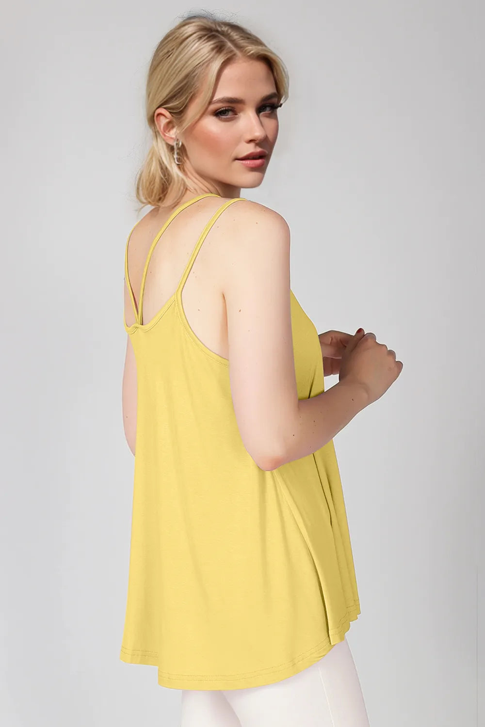 Bamboo scoop neck cami in light yellow with double spaghetti straps—back view