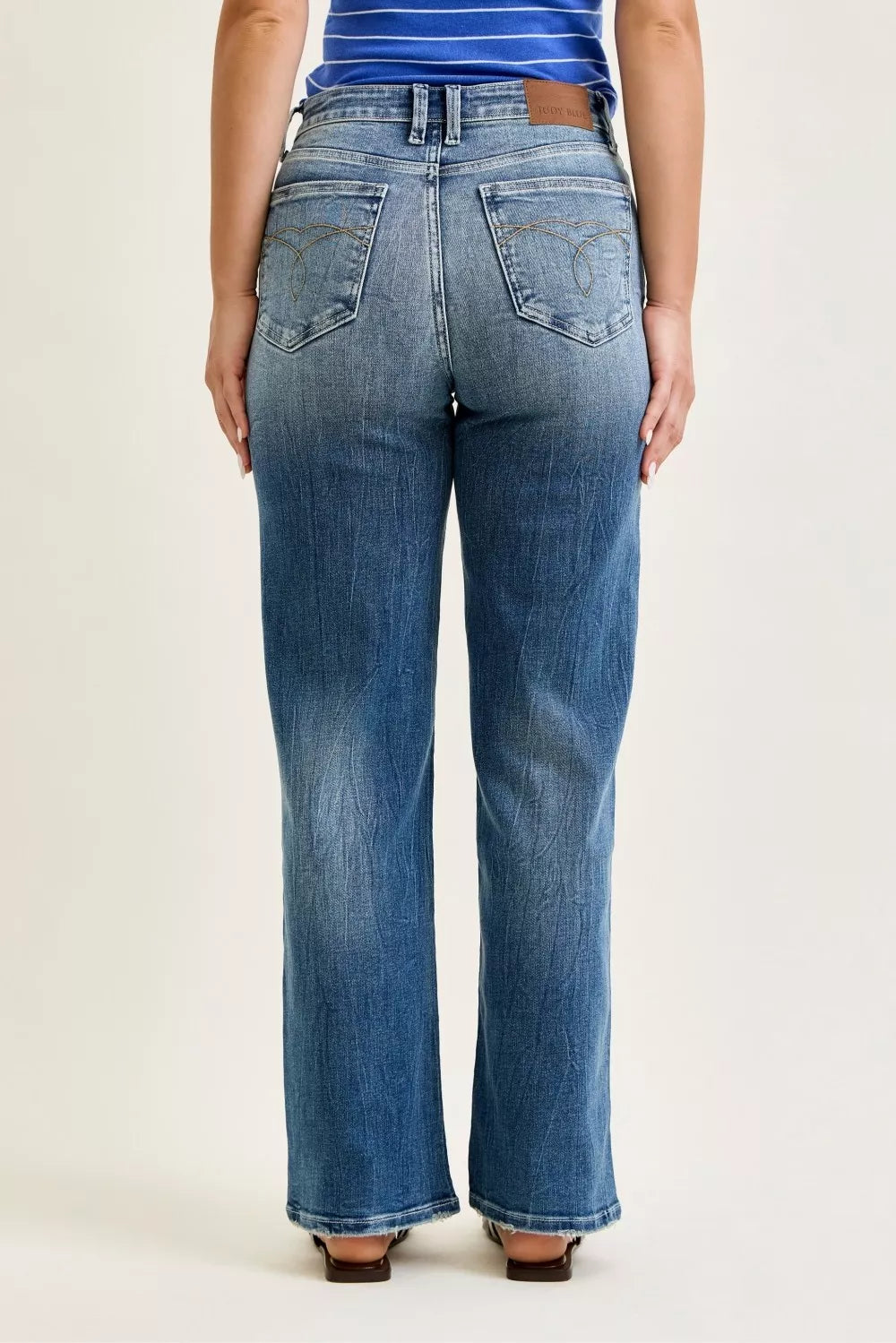 Mid-rise 90s straight jeans in medium wash, back view with two pockets