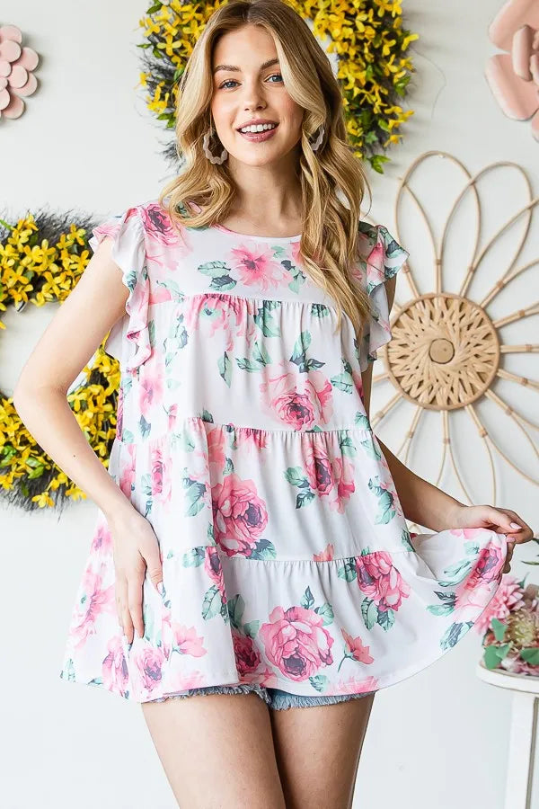 Cream floral tiered short top with ruffled cap sleeves and round neckline
