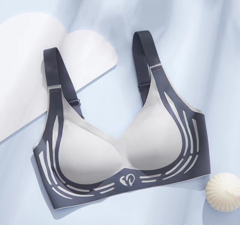 Adjustable sports bra in dark gray with racerback straps and abstract line print