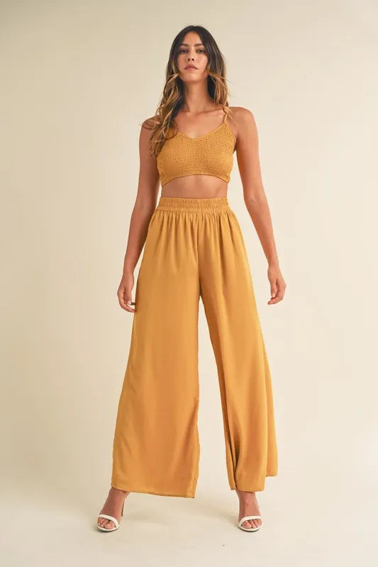 Gold mustard smocked bralette crop top with wide-leg pants, gathered waist