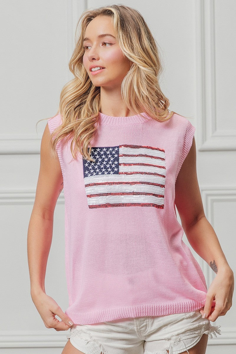 Pink knit sleeveless top with American flag sequin patch on the front panel