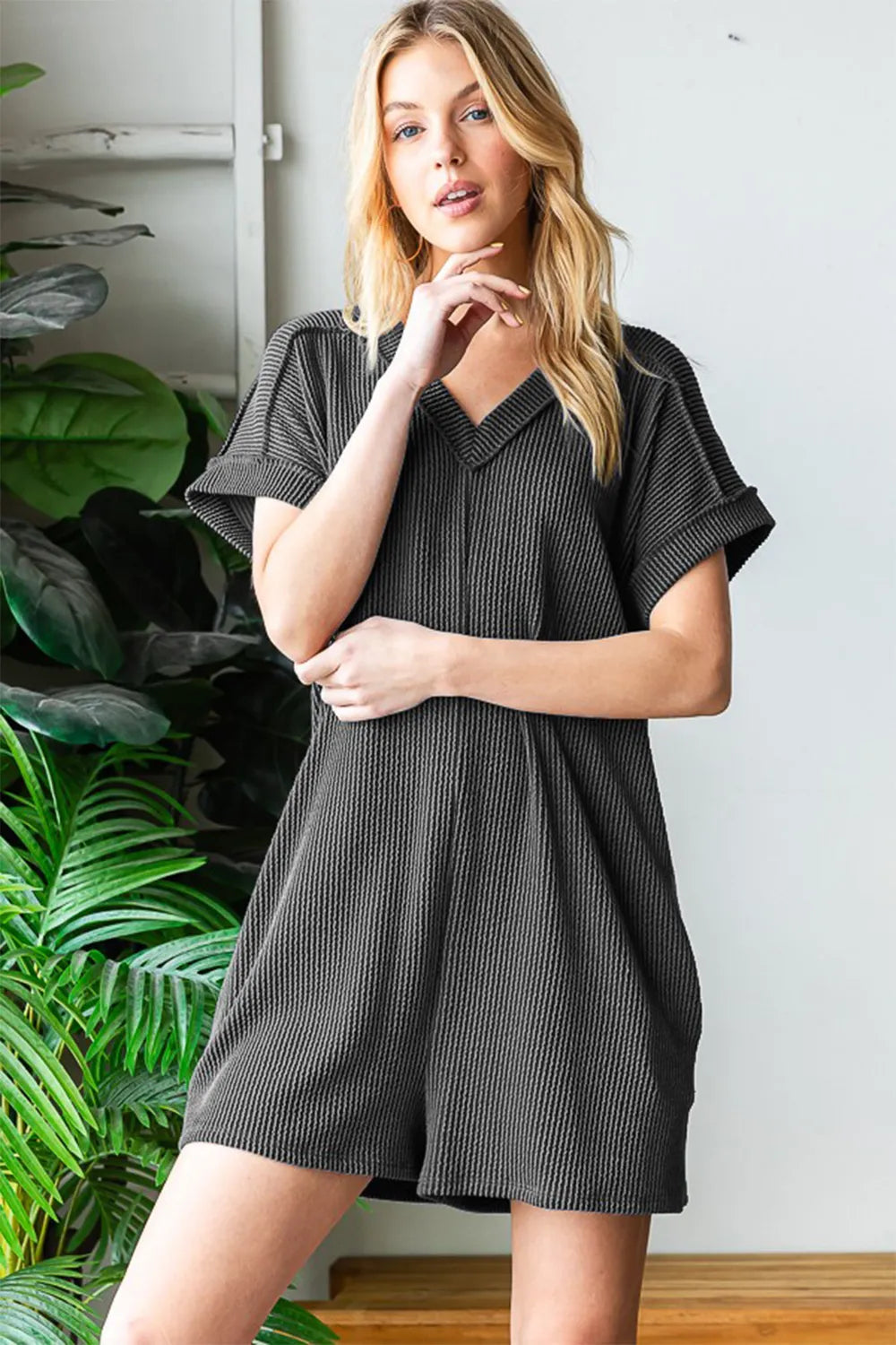 Charcoal ribbed short-sleeve romper with collar and front button placket