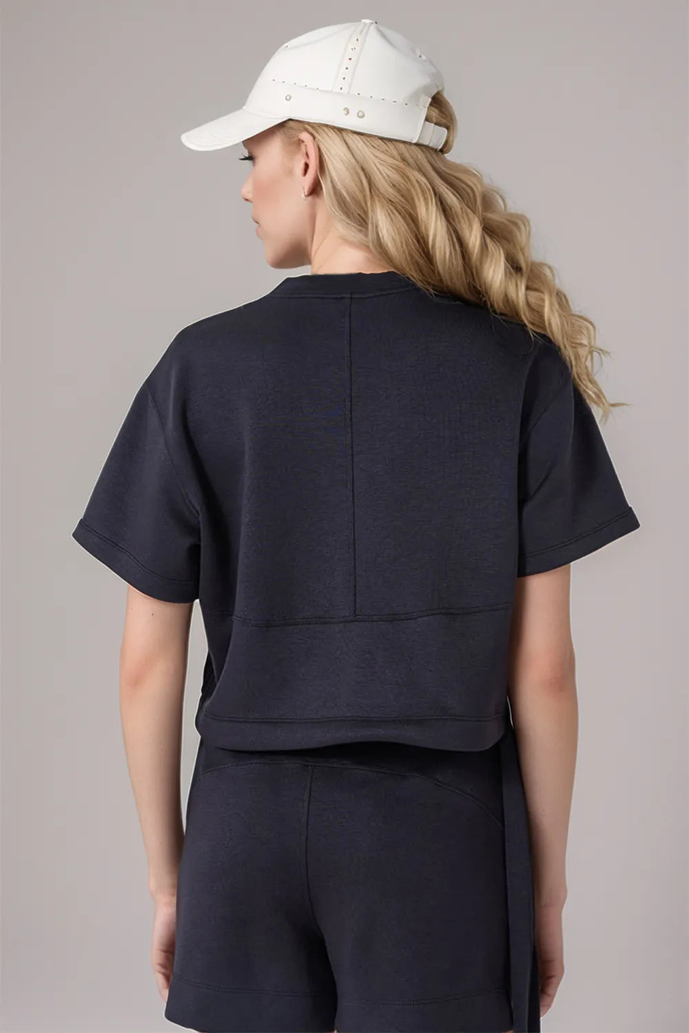 Back view: dark gray short-sleeve round-neck air scuba tee with drawstring hem