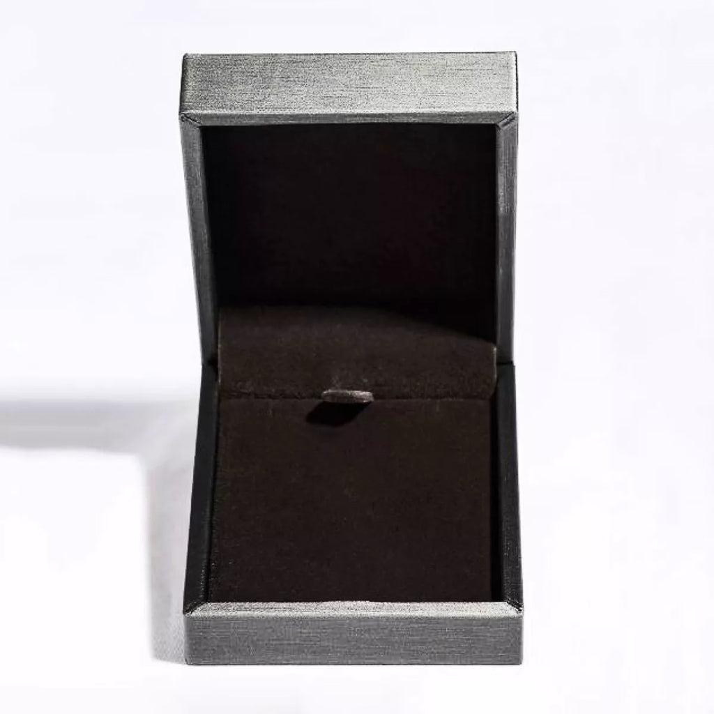 Black jewelry gift box with hinged lid and ribbon-style insert for pendant necklace